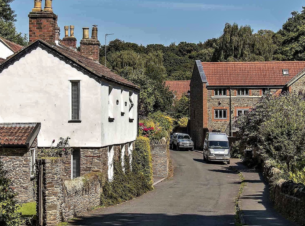 Historic cottages along a quiet lane in Frenchay village, Bristol